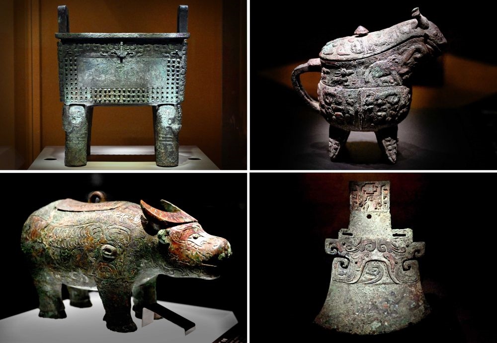 這是殷墟博物館新館內(nèi)展出的“司母辛”銅鼎（左上）、“亞長(zhǎng)”銅觥（右上）、“亞長(zhǎng)”牛尊（左下）、“亞長(zhǎng)”銅鉞（拼版照片，2月23日攝）。