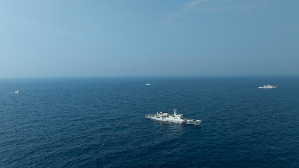 4月22日，中越海警艦艇編隊在北部灣海域開展聯(lián)合巡邏。（中國海警供圖）